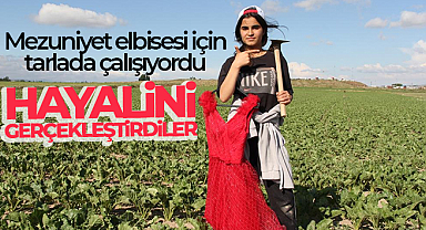 Mezuniyet elbisesi için tarlada çalışıyor