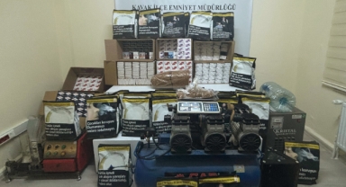 Kaçak sigara imalathanesi gibi market