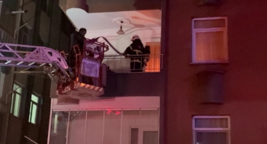 Yangında evde mahsur kalan çocuğu ekipler kurtardı