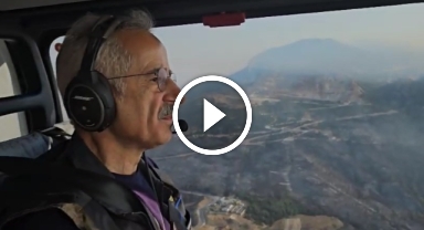 Bakan Uraloğlu, helikopterle yangın bölgesini havadan inceledi   